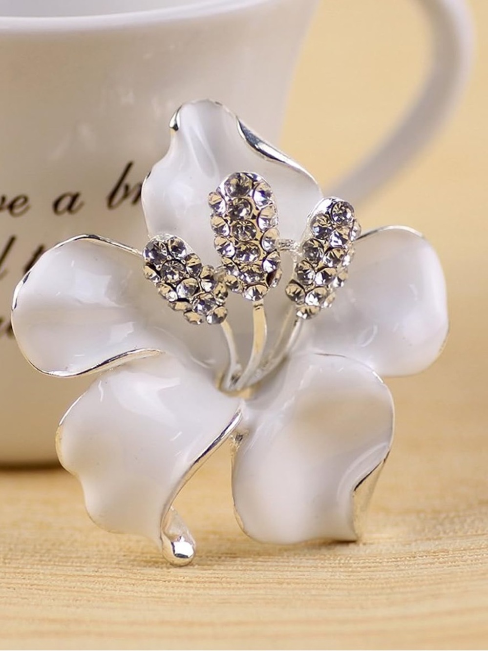 Anthropologie White Enamel Flower Brooch with Crystal Stamens